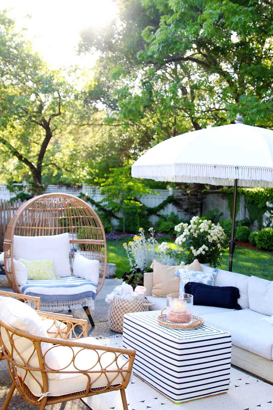 Patio furniture inspo featuring a beachy styled outdoor living room