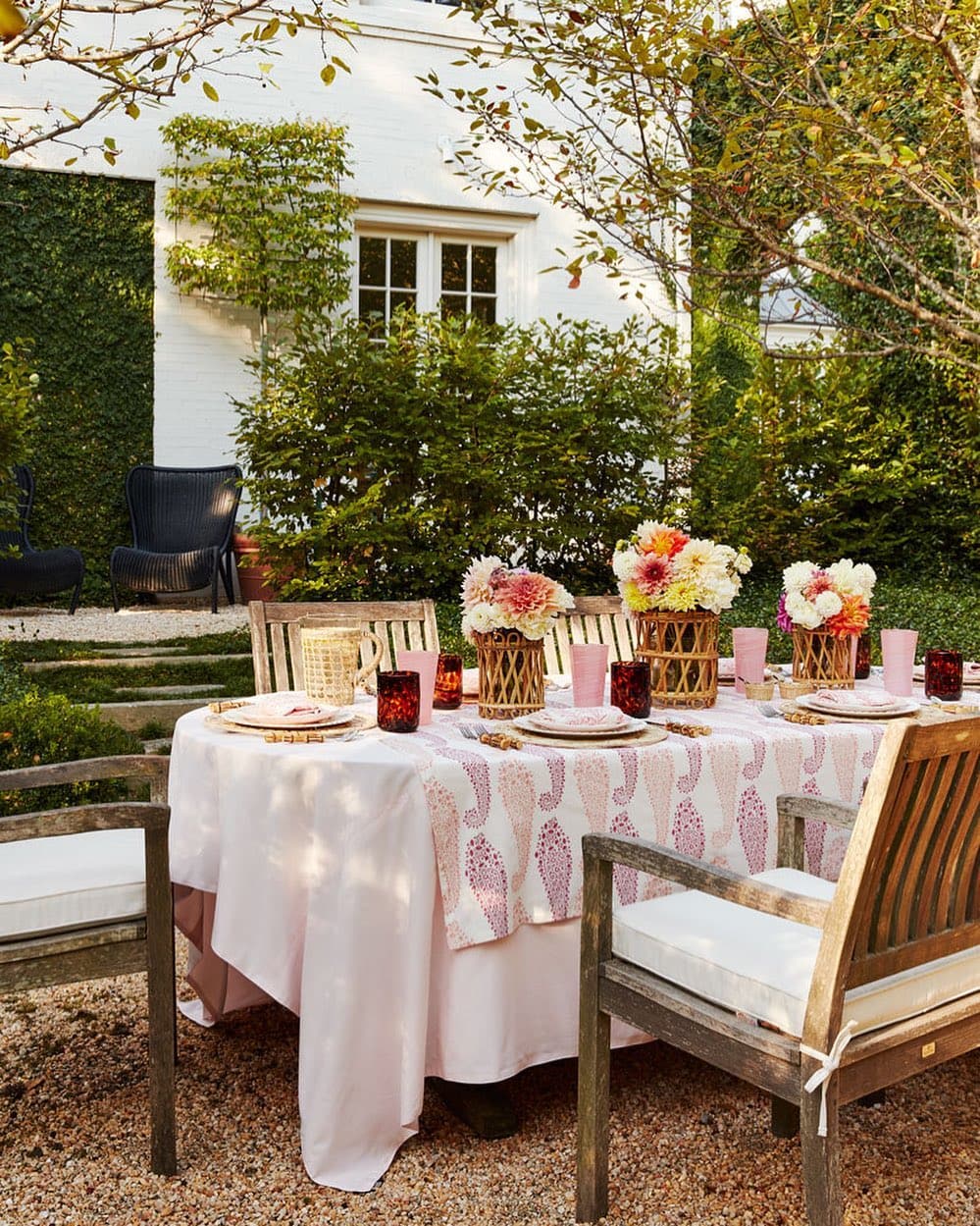 Patio furniture inspo featuring a traditional styled outdoor patio with wooden table and chairs