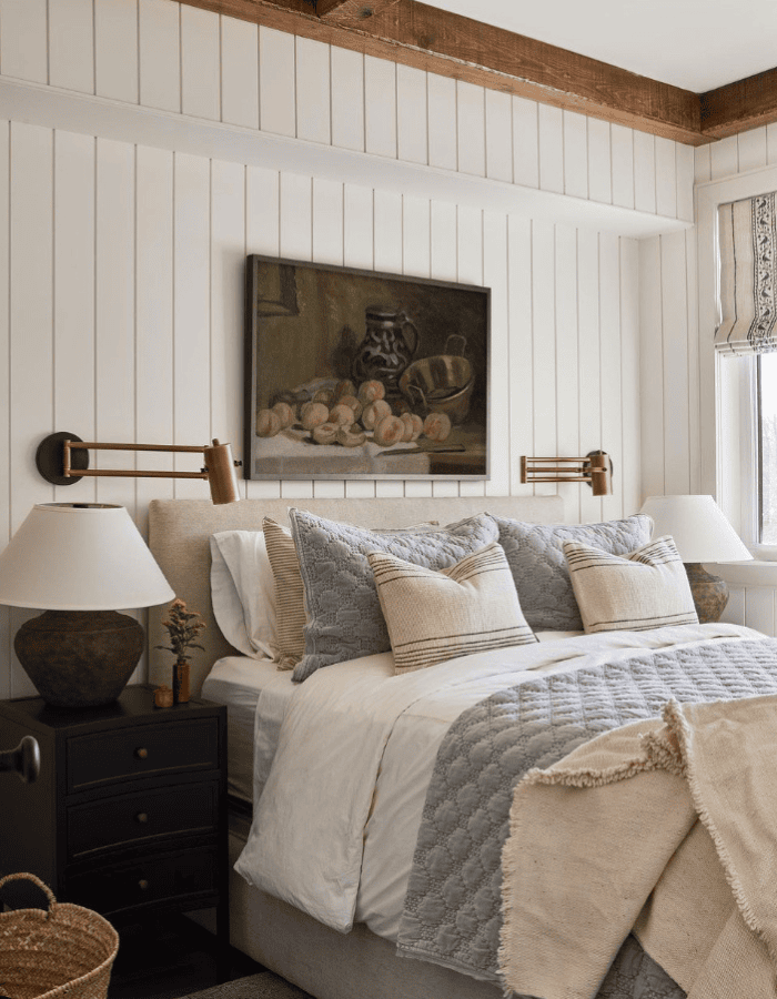 Bedroom decorated for fall and winter featured as an example of seasonal bedding swaps