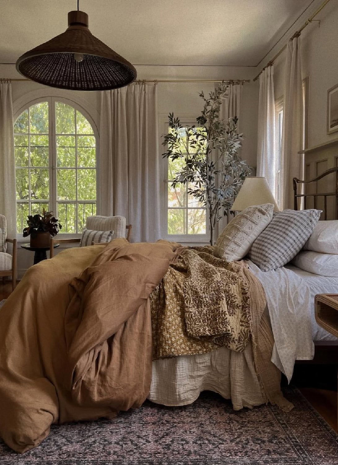 Layered winter bedding with duvet and throw.