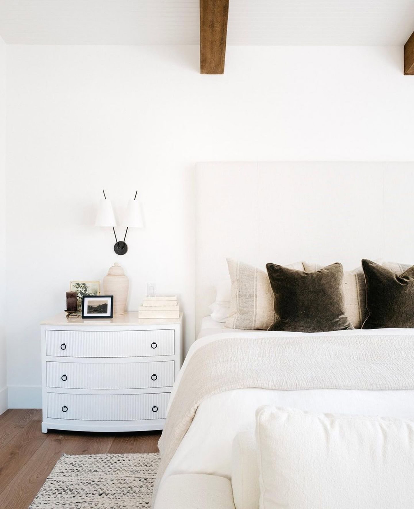 Bedroom decorated for fall and winter featured as an example of seasonal bedding swaps