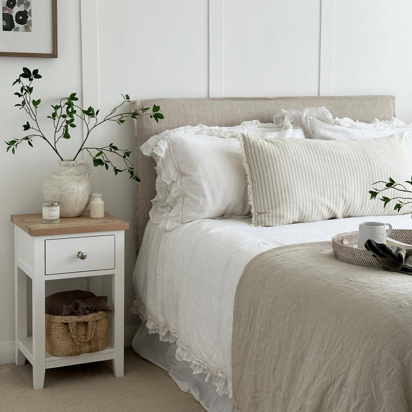 Bedroom decorated for fall and winter featured as an example of seasonal bedding swaps