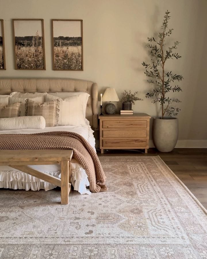 Bedroom decorated for fall and winter featured as an example of seasonal bedding swaps