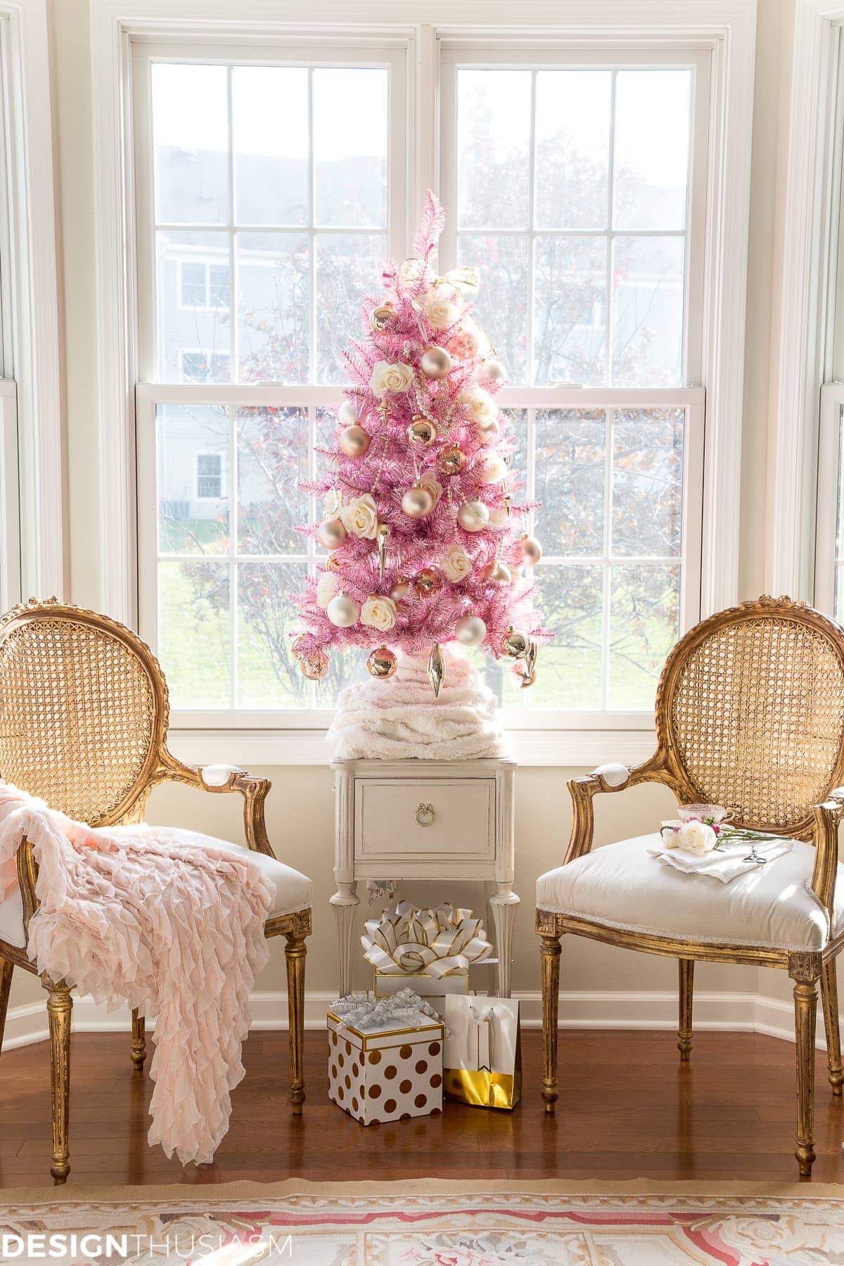 Pink Christmas Decorations inspiration, showcasing a pink christmas tree in a living room with a french elegant style.