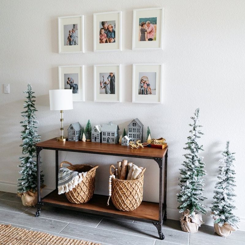 Holiday entryway idea featuring an foyer in modern style with gallery wall