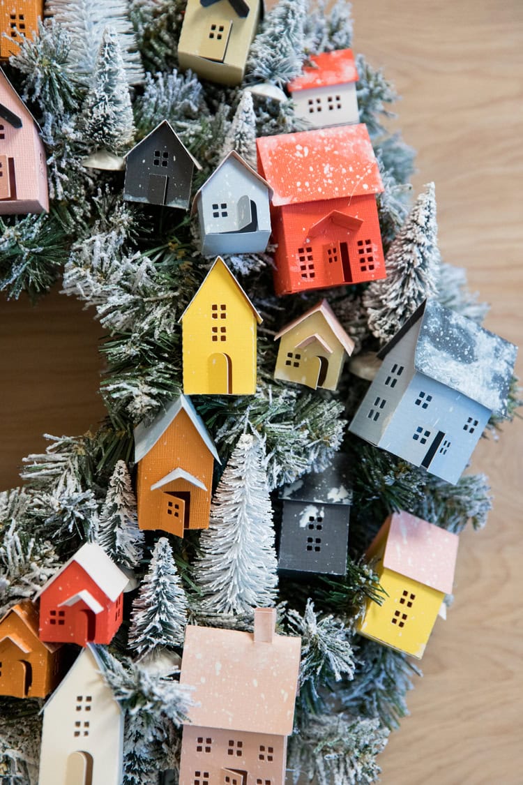 Christmas Wreath idea featuring a wreath with colorful small paper houses