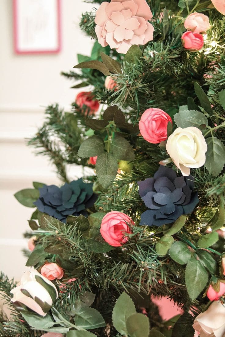 Kid-friendly Christmas decor ideas example featuring a Christmas decorated with paper flowers