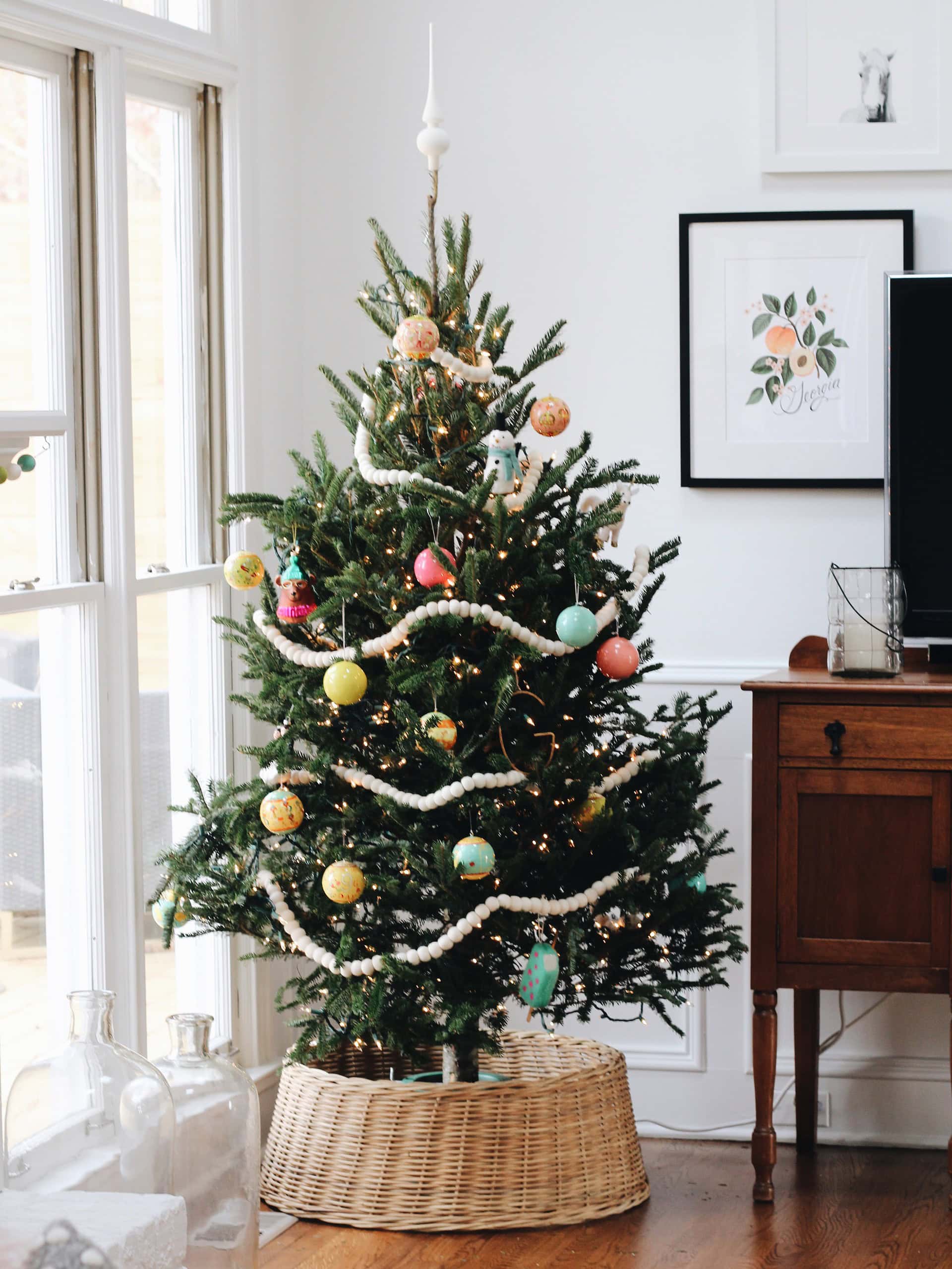Kid-friendly Christmas decor ideas example featuring a evergreen Christmas potted tree