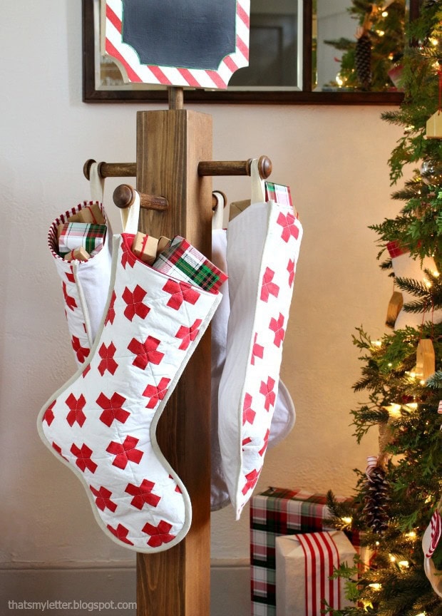 Christmas Stocking Holder Ideas for a Cozy Display Without a Fireplace featuring a stockings hanging from rustic coat rack DIY