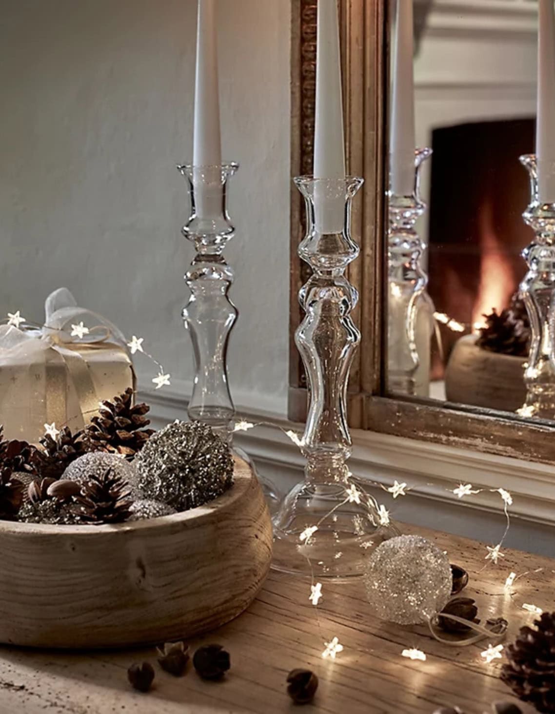 Example of side table showcasing New Year's decorations in traditional style along with other new years decorations tips and examples.
