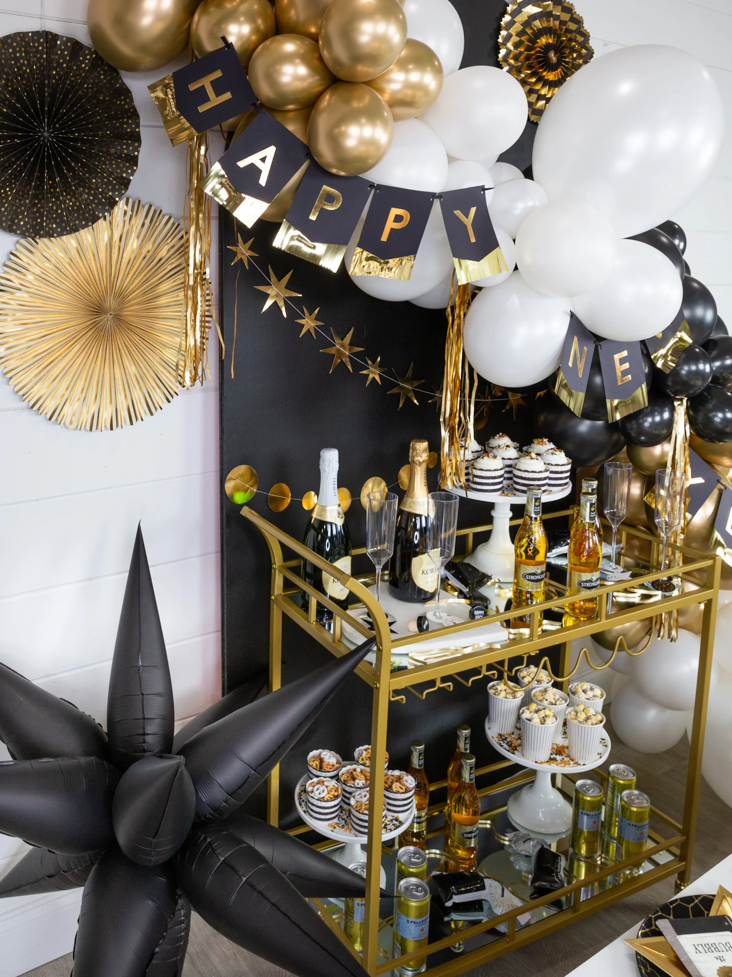 Example of bar cart showcasing New Year's decorations in modern style along with other new years decorations tips and examples.