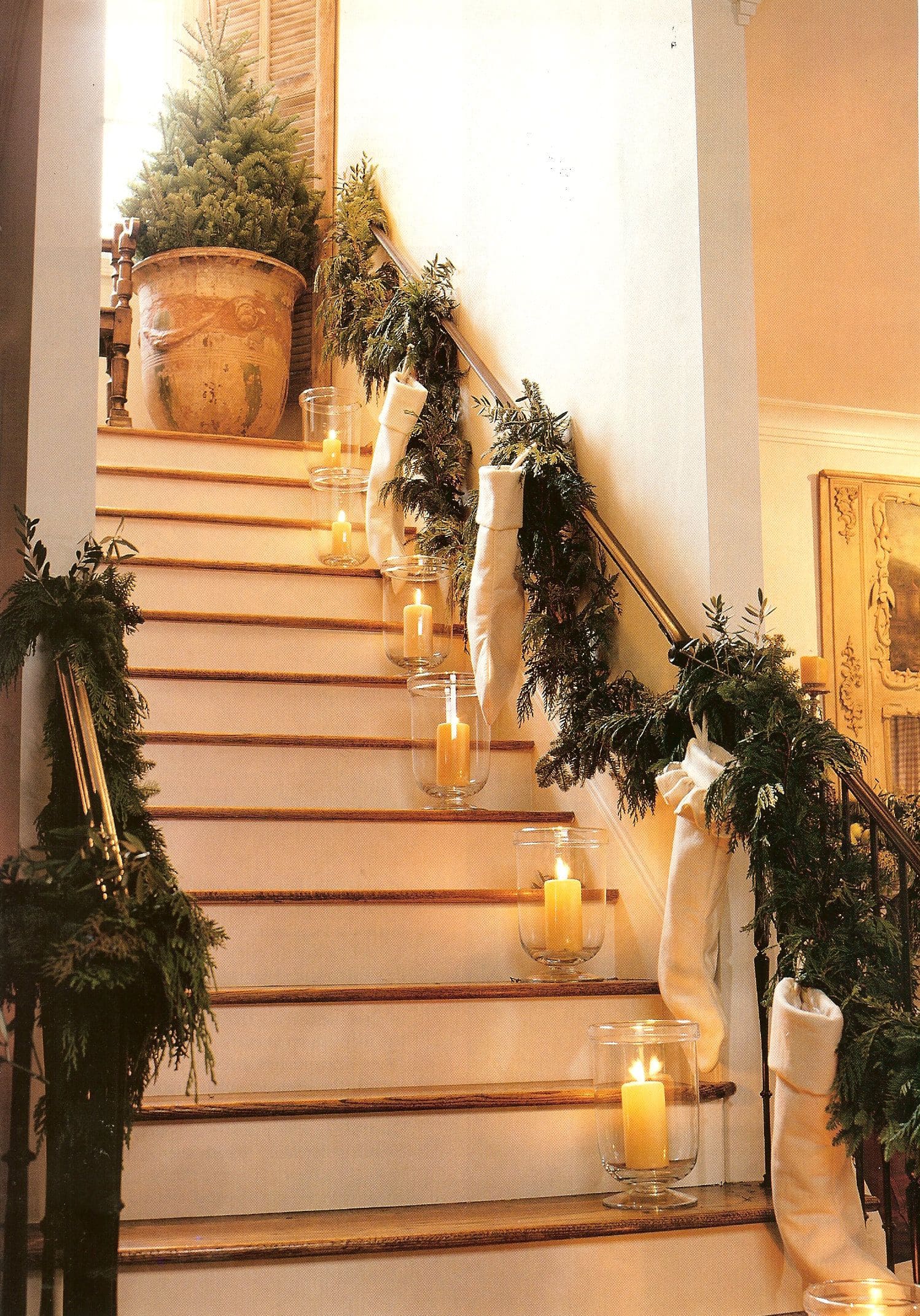 Christmas Stocking Holder Ideas for a Cozy Display Without a Fireplace featuring a stockings hanging from stairs