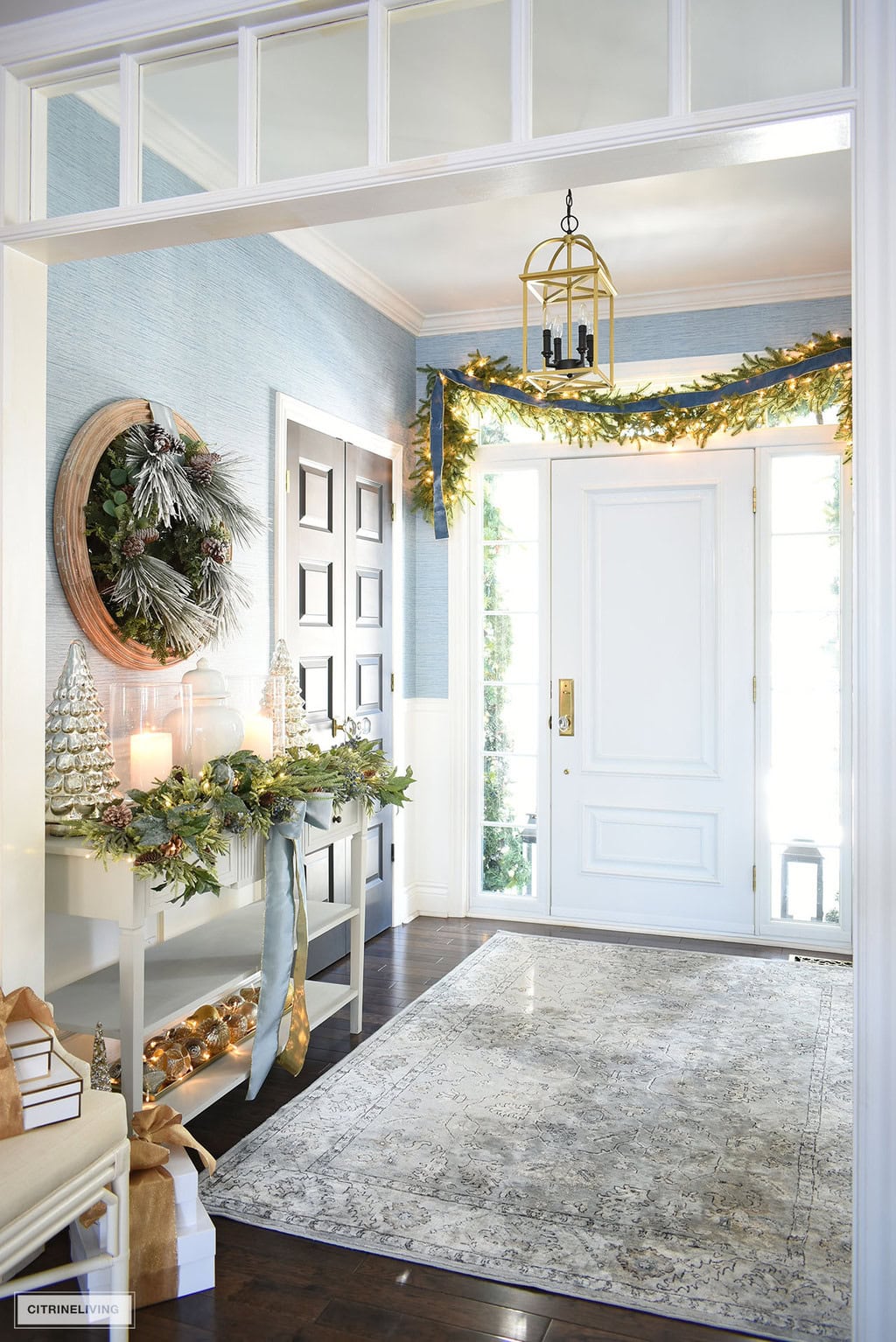 Holiday entryway idea featuring an entrance in coastal traditional style