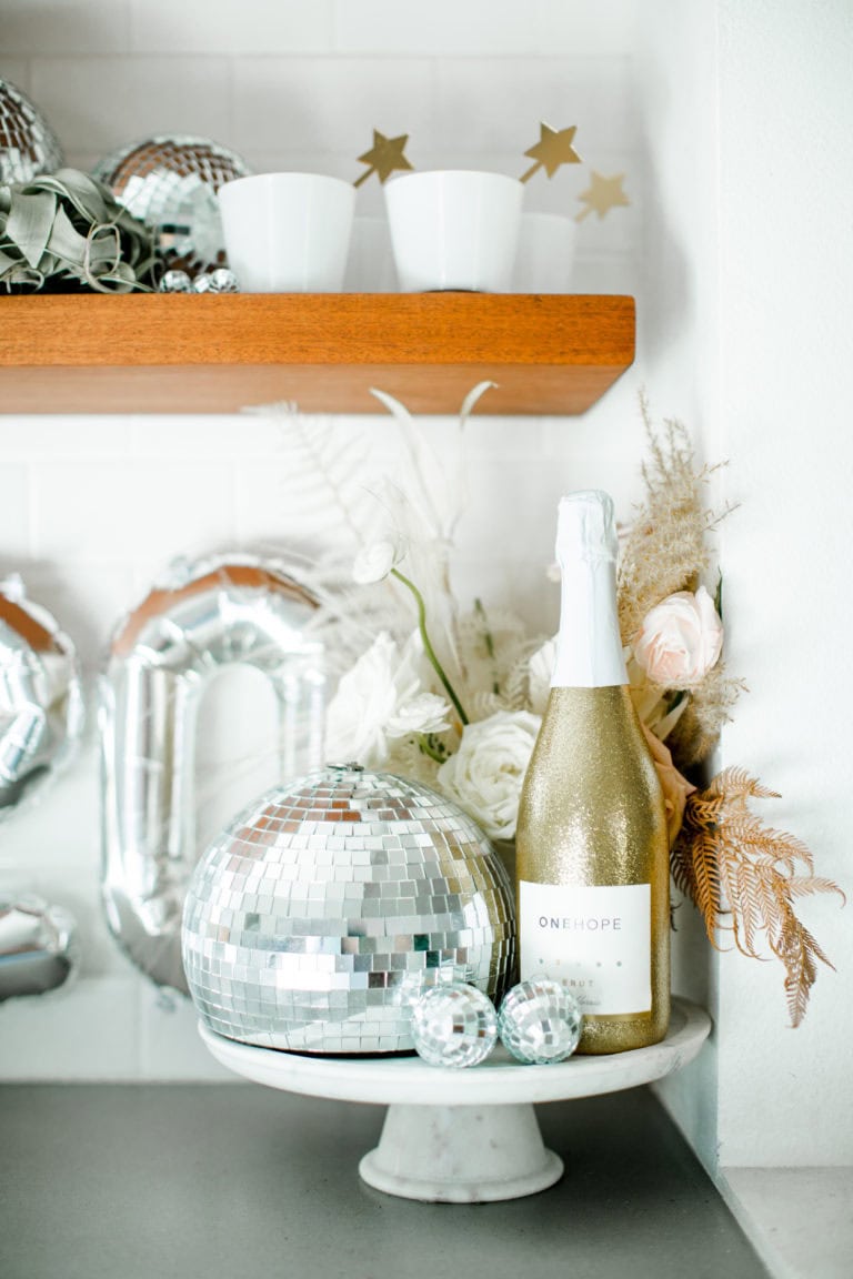 Example of kitchen countertop showcasing New Year's decorations in contemporary style along with other new years decorations tips and examples.