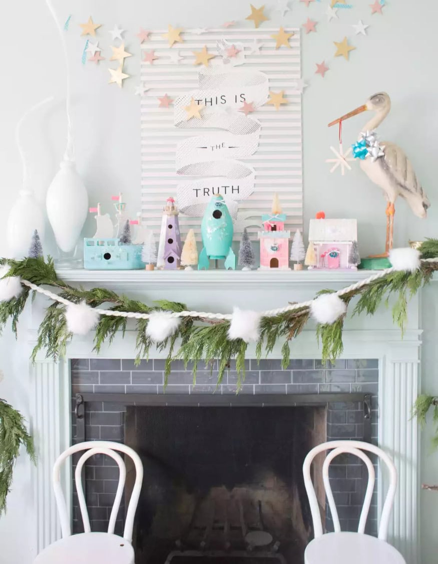 Kid-friendly Christmas decor ideas example featuring a colorful vignette with pastel colors above a fireplace