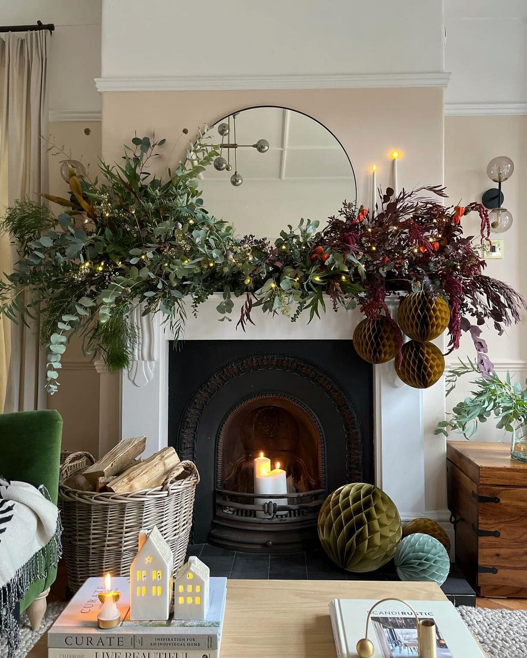 Example of Christmas mantel decor idea featuring a modern traditional look above a fireplace