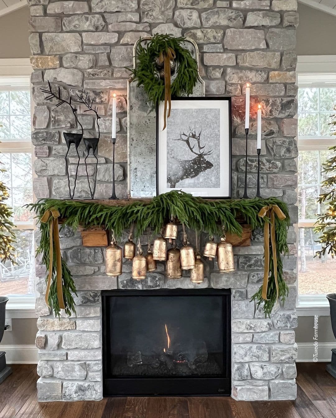 Example of Christmas mantel decor idea featuring a rustic look above a fireplace
