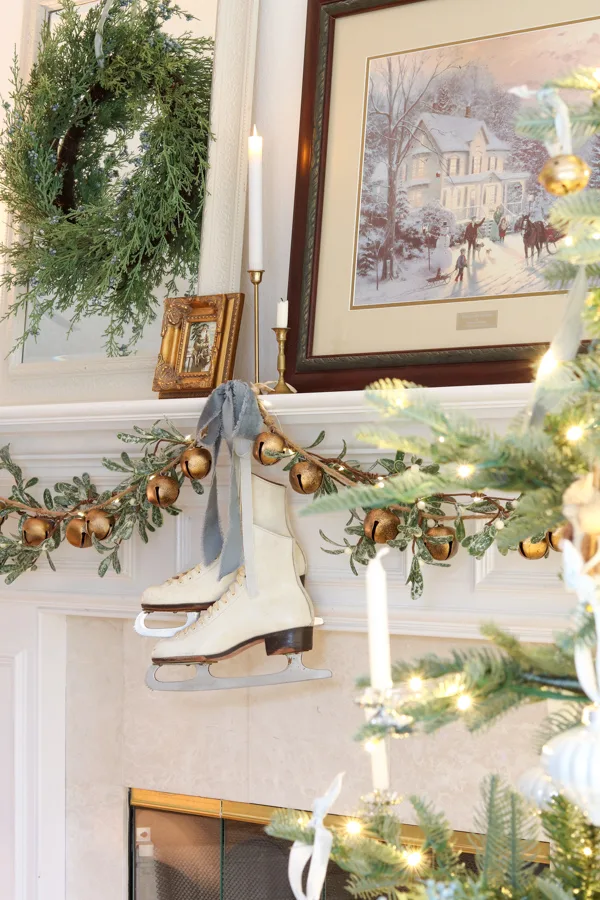 Example of Christmas mantel decor idea featuring a vintage-style look above a fireplace