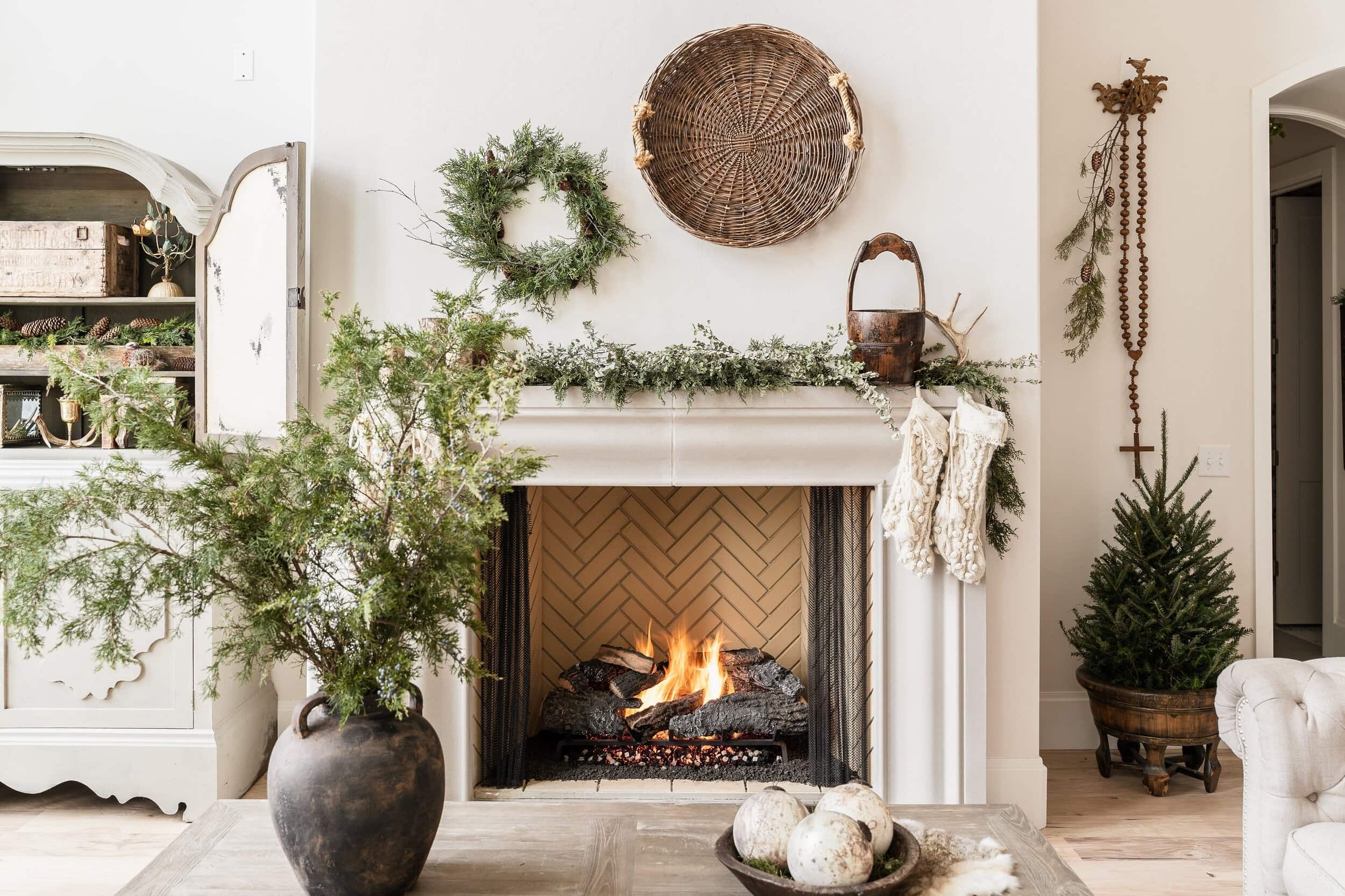 Example of Christmas mantel decor idea featuring a french rustic look above a fireplace
