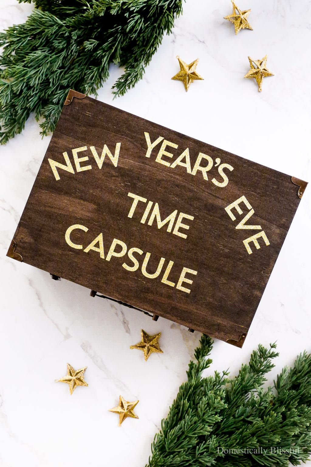family Christmas traditions idea featuring New Year's Eve time capsule DIY idea