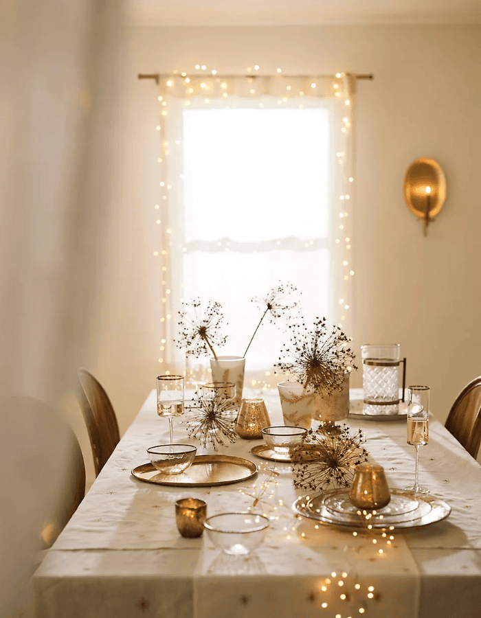 New Years center pieces idea featuring a delicate metal gold garland
