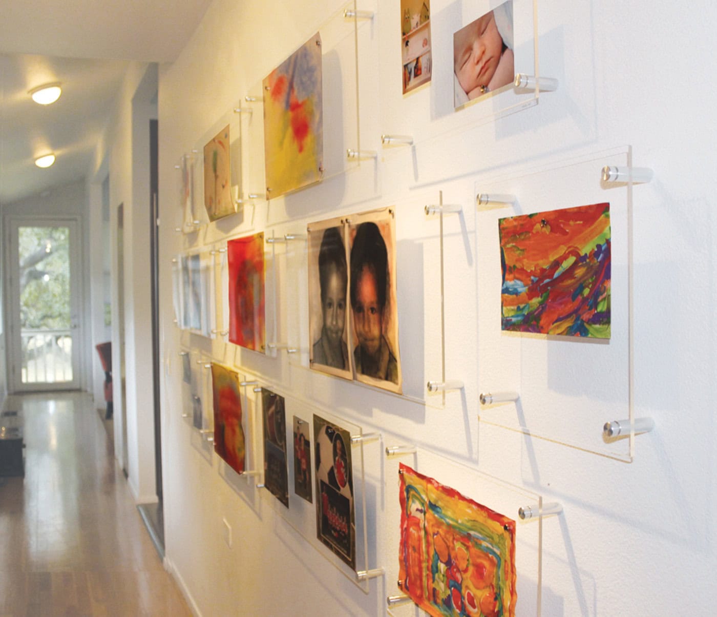 Ideas to display your kids' holiday artwork around the home featuring gallery wall