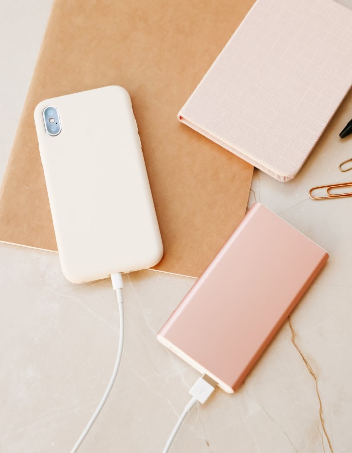 declutter before new years idea featuring two pink smartphones