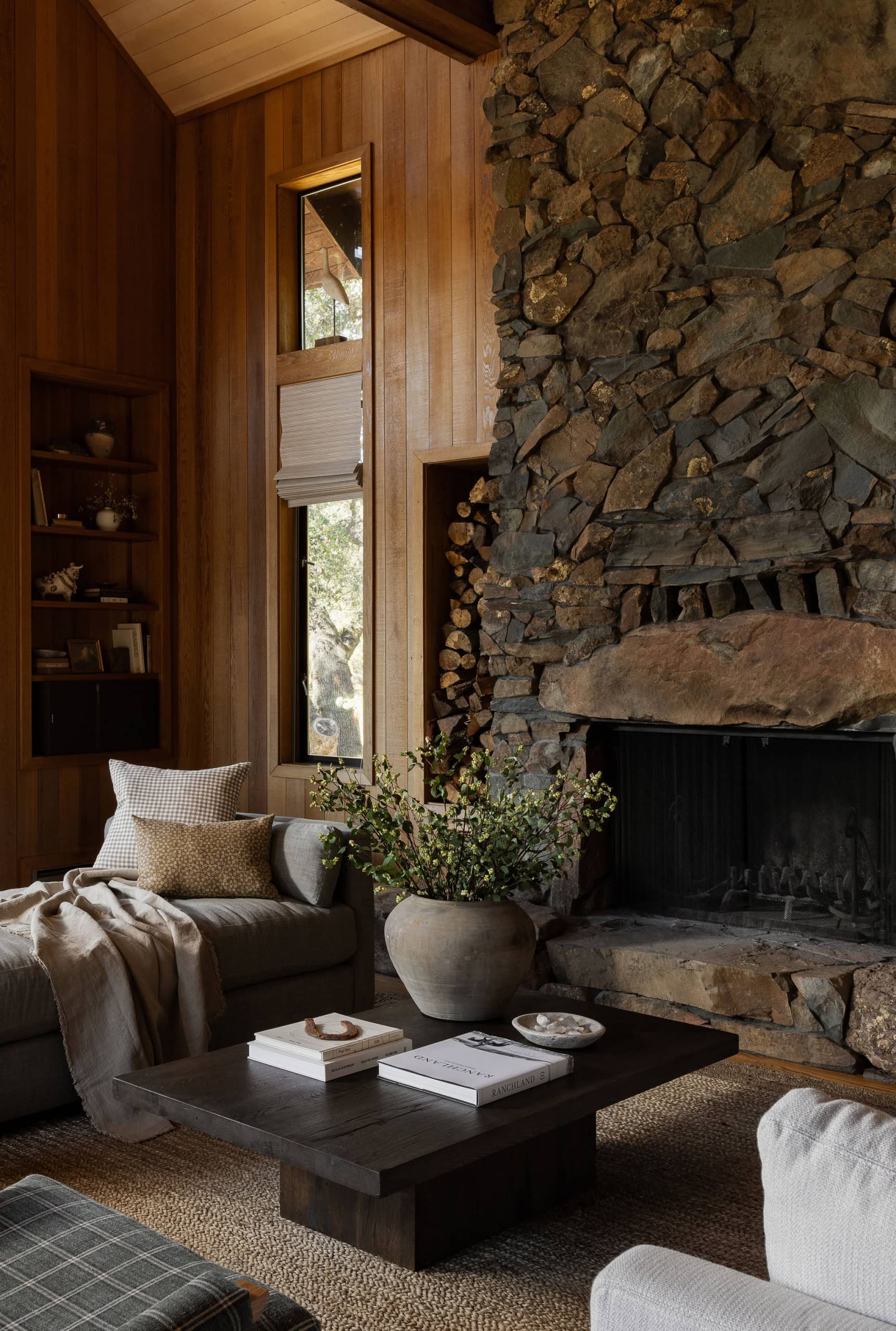 Decorating after Christmas idea featuring a rustic but elevated reading corner during winter in neutral tones