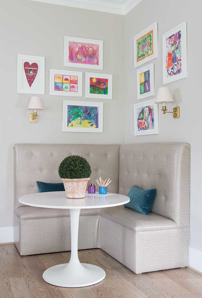 Ideas to display your kids' holiday artwork around the home featuring gallery wall