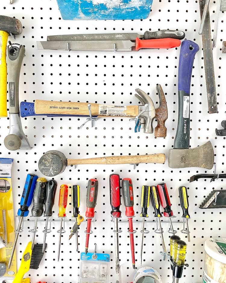 Declutter before new year idea featuring a garage wall storage solution