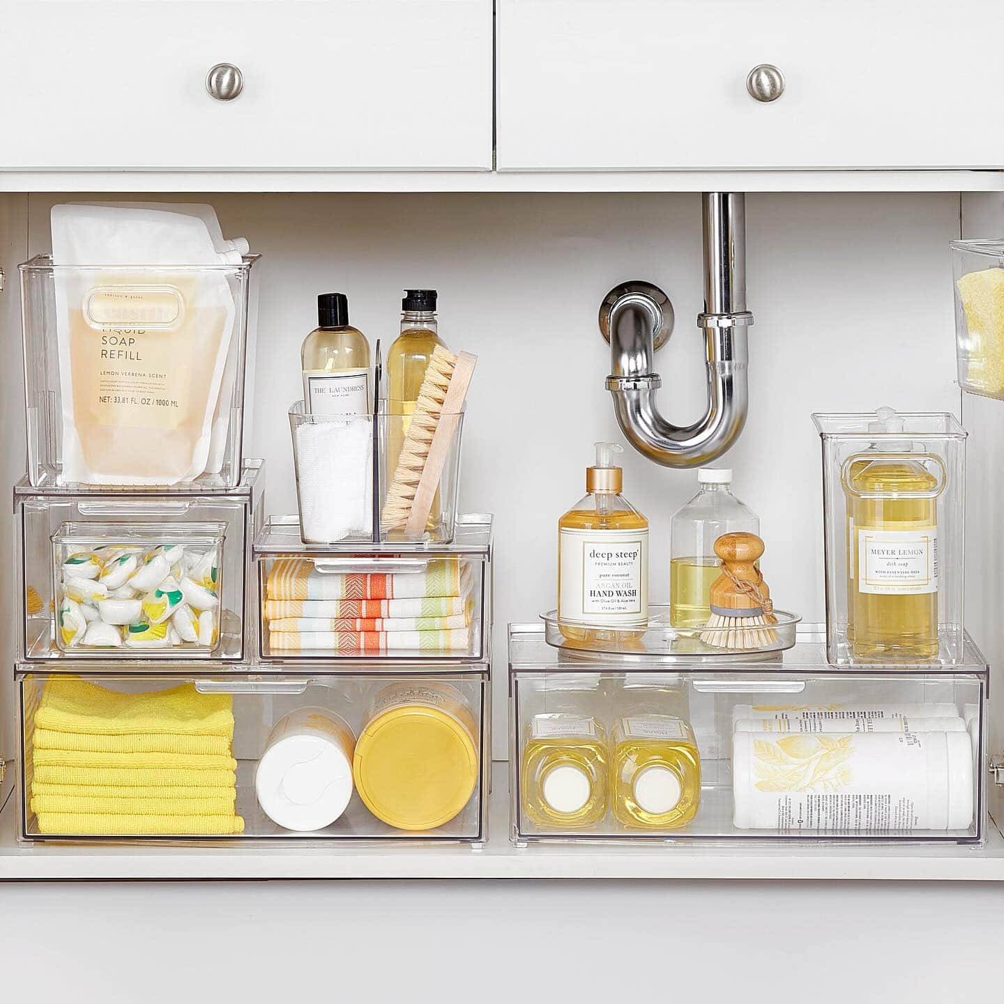 Declutter before new year idea featuring a under the sink bathroom storage solution