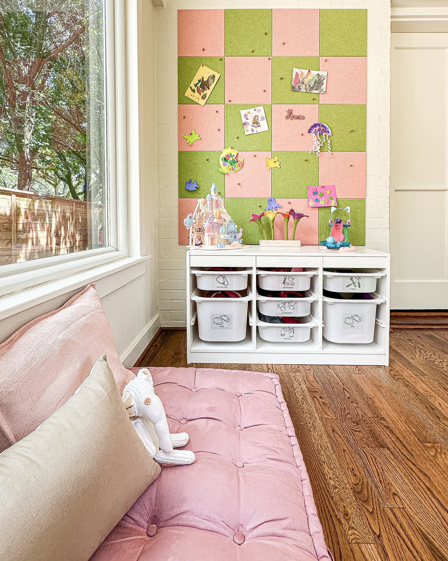 Declutter before new year idea featuring child's room with toy boxes