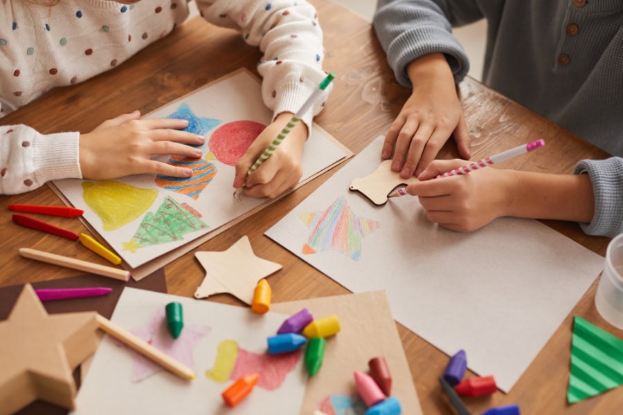 family Christmas traditions idea featuring child making crafts
