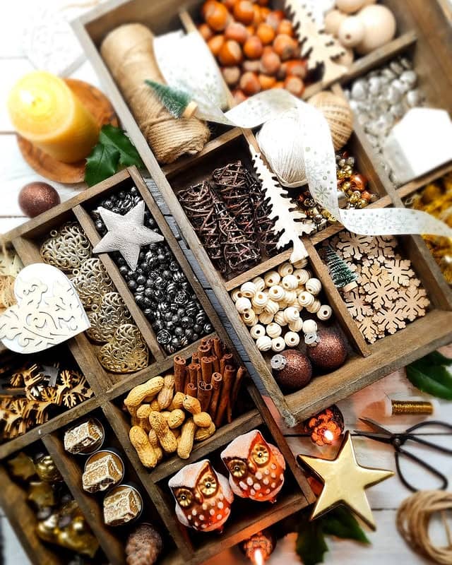 Holiday decor storage ideas featuring a ornaments inside storage boxes
