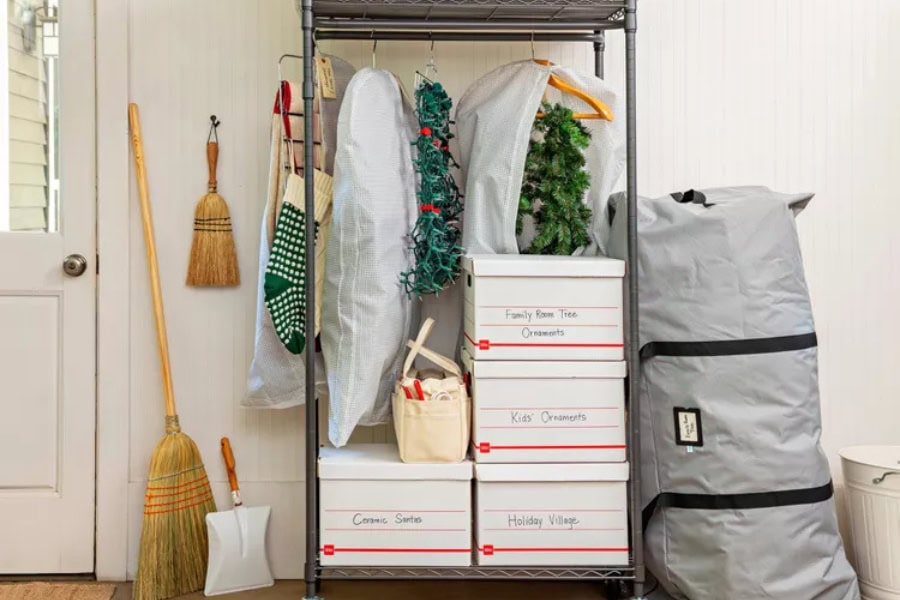 Holiday decor storage ideas featuring a shelving unit with Christmas decor
