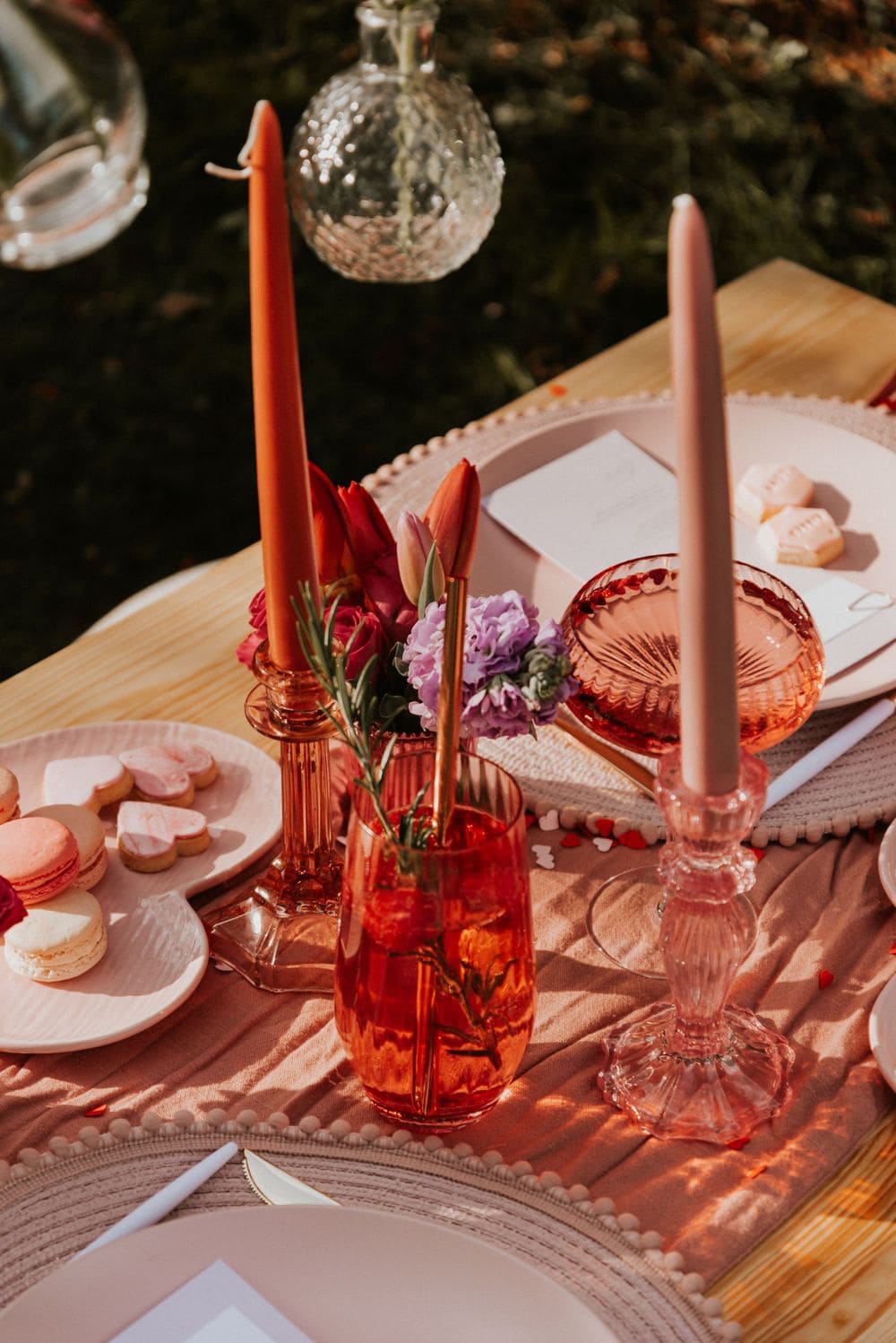 Valentines Day Brunch idea featuring a tablescape with red glass vases