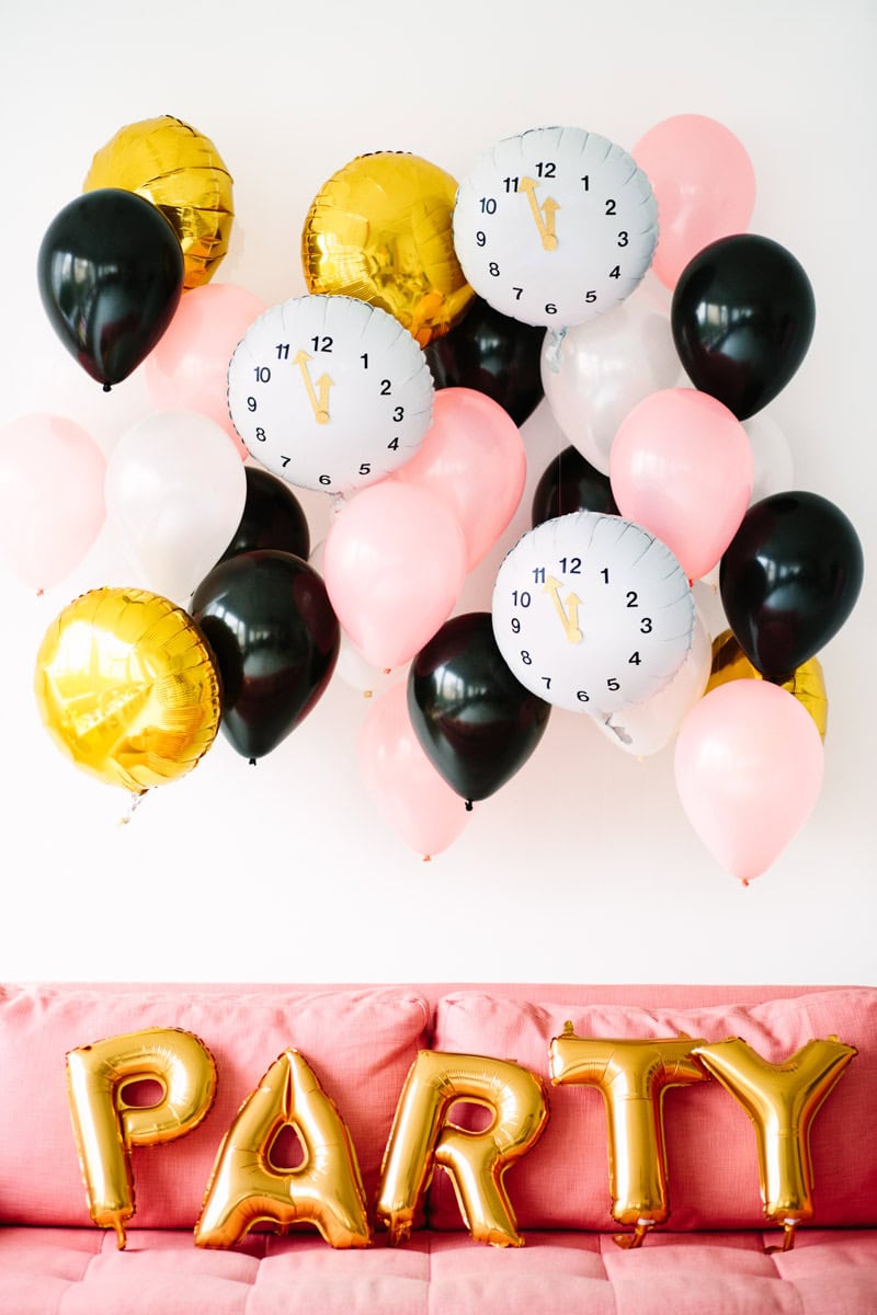 Celebrating New Year's eve with kids featuring a colorful Balloon Pop Countdown