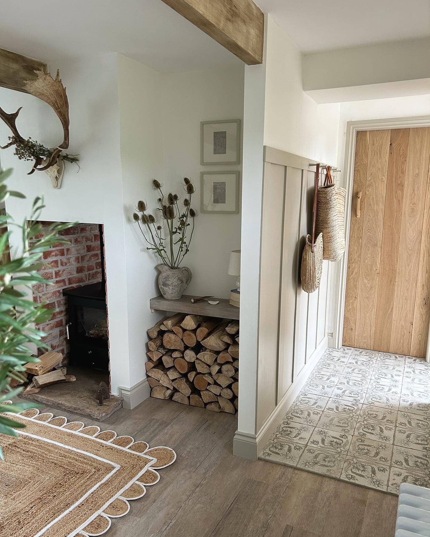 Decorating after Christmas idea featuring a minimalist entryway with winter decor