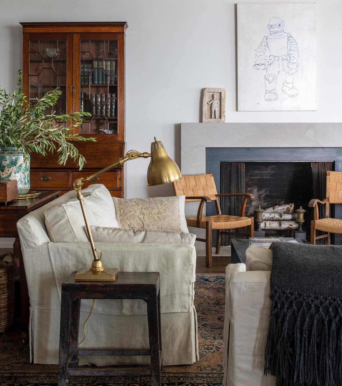 Home design trends 2025 idea featuring a living room with a modern heirloom decor style
