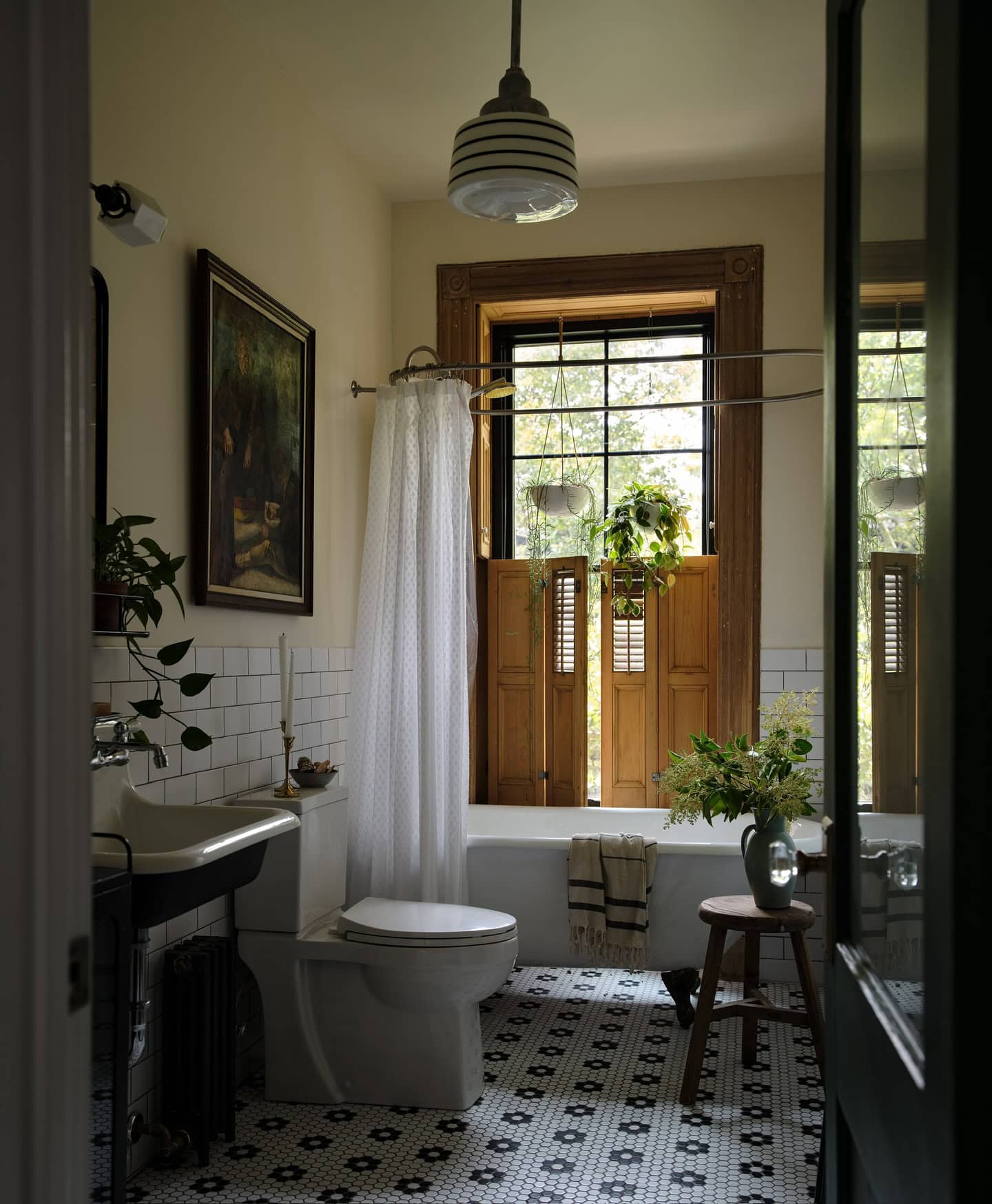 Home design trends 2025 idea featuring a indoor plants in remodeled antique bathroom
