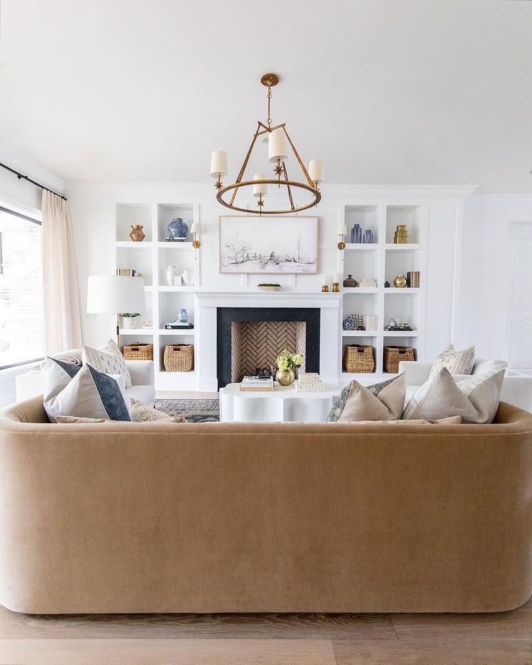 Home design trends 2025 idea featuring a living room with bright white and brown hues palette