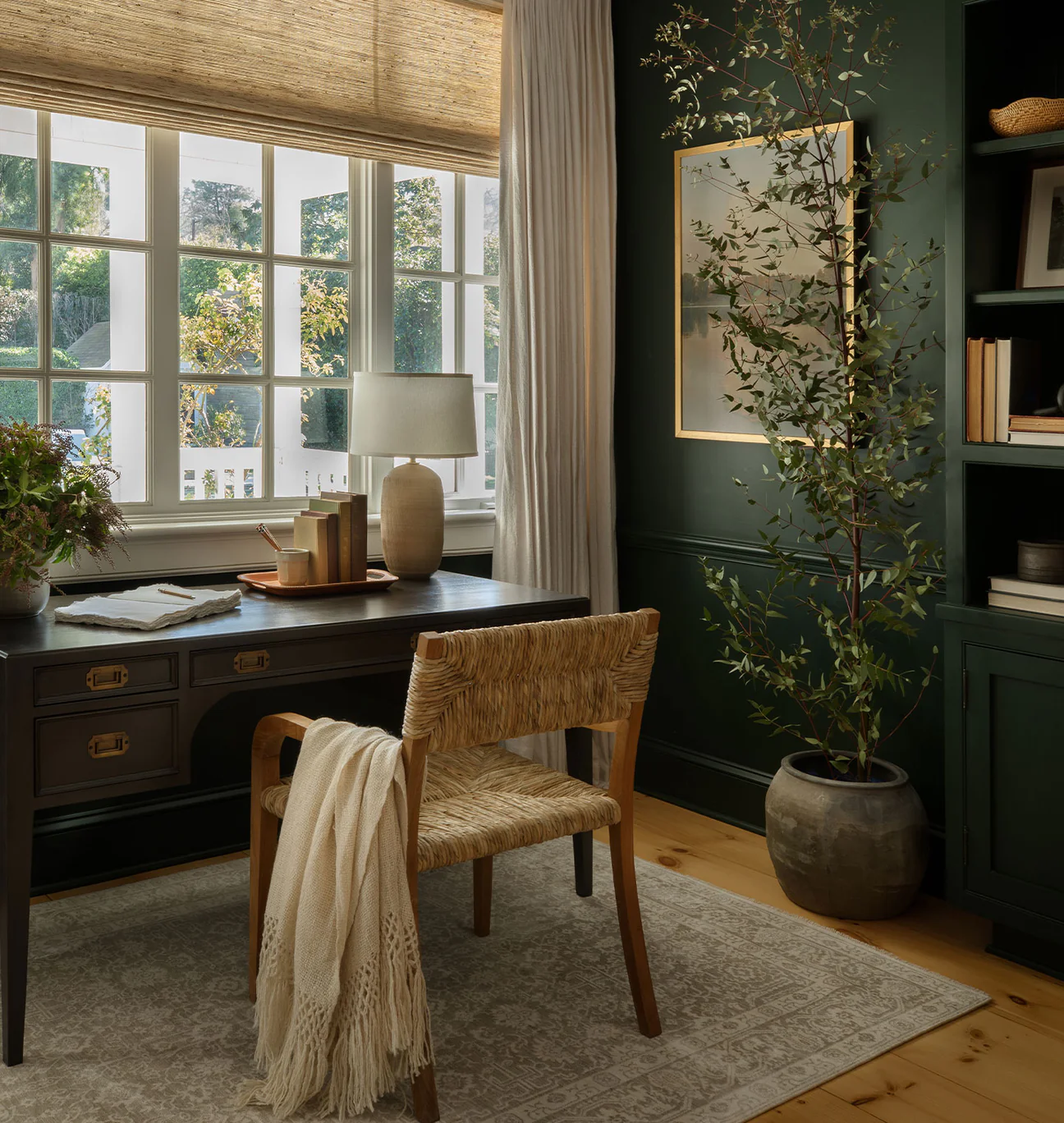 Home design trends 2025 idea featuring a home office with green and brown color palette