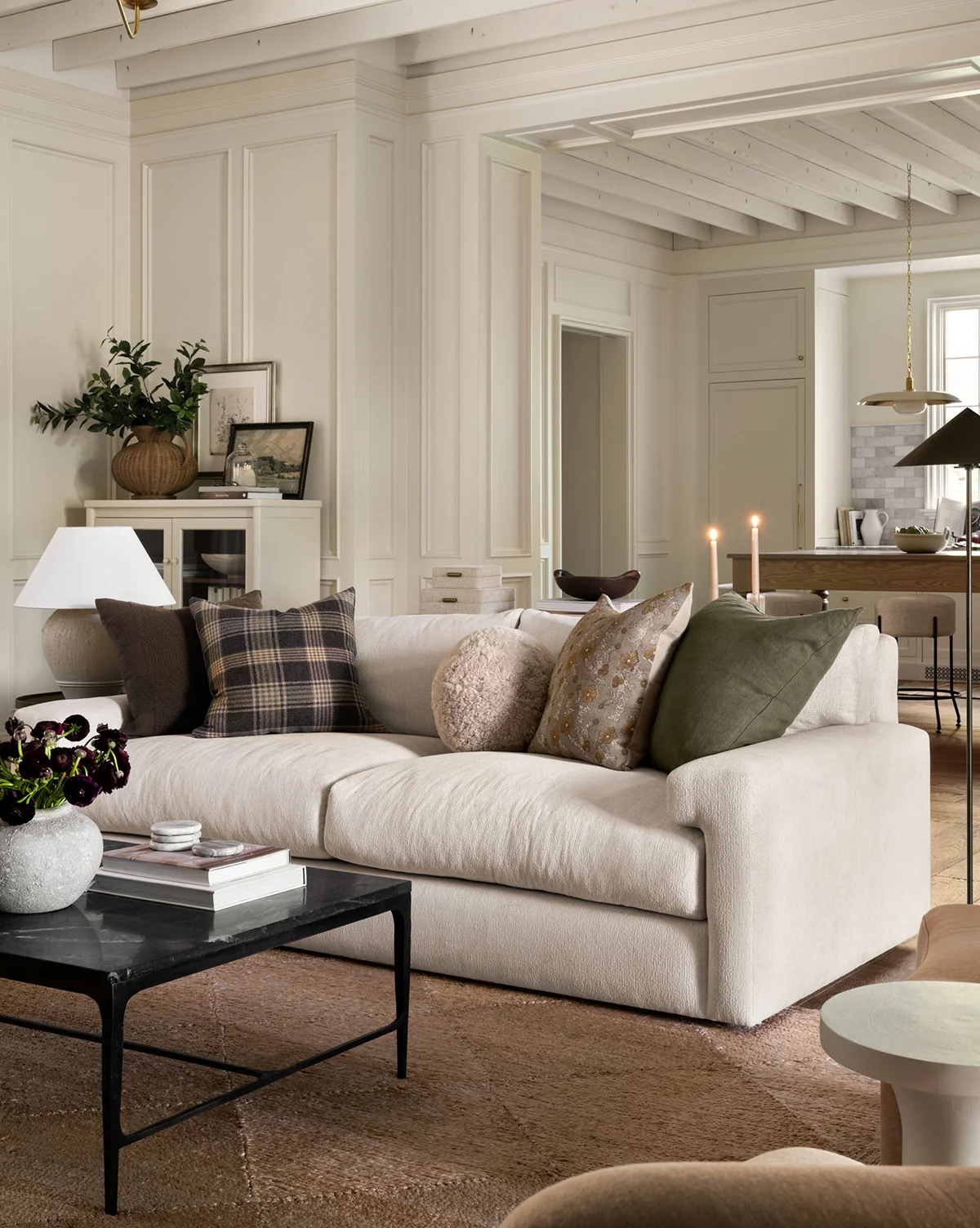 Home design trends 2025 idea featuring a living room with neutral brown hues palette