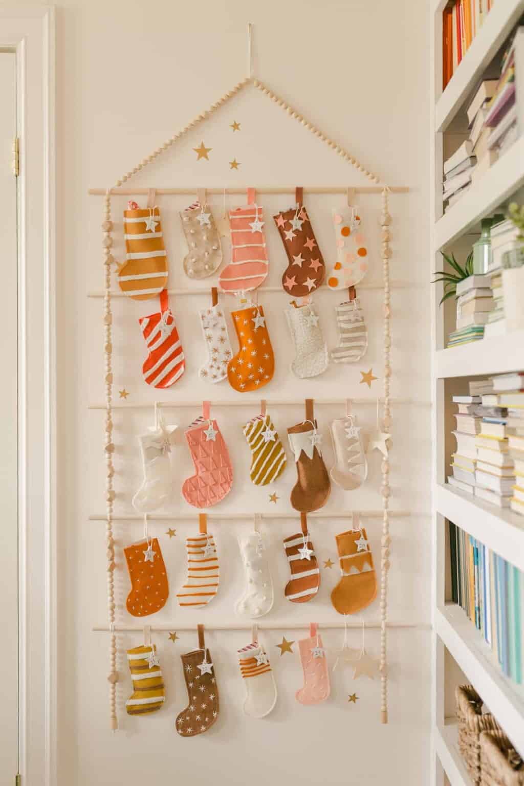 Kid-friendly Christmas party idea featuring a bedroom with soft and tactile christmas decor ornaments