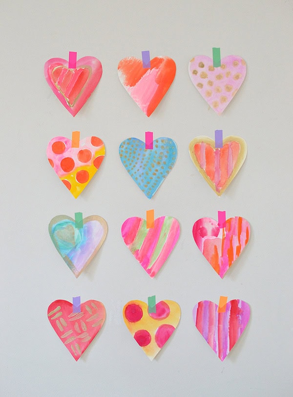 DIY Valentines kid-friendly craft idea featuring watercolor hearts