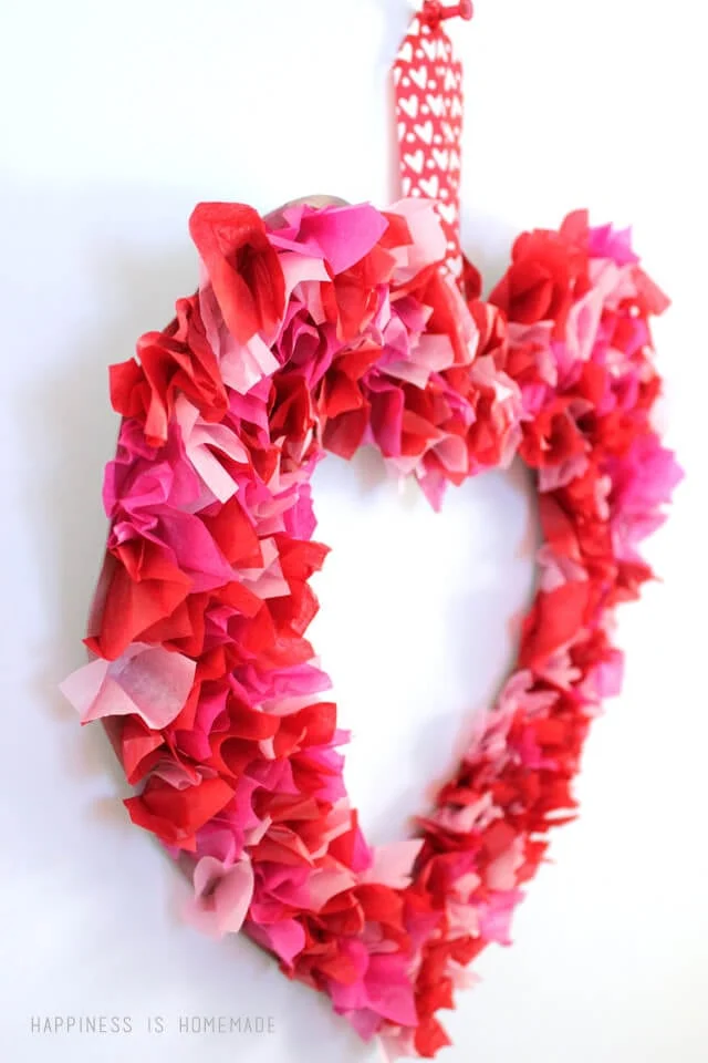DIY Valentines kid-friendly craft idea featuring tissue hearts