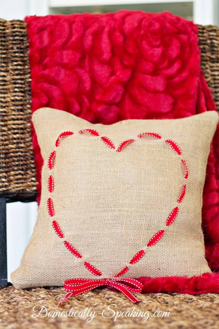 DIY Valentine's Day Decor idea featuring heart-shaped detailed pillow