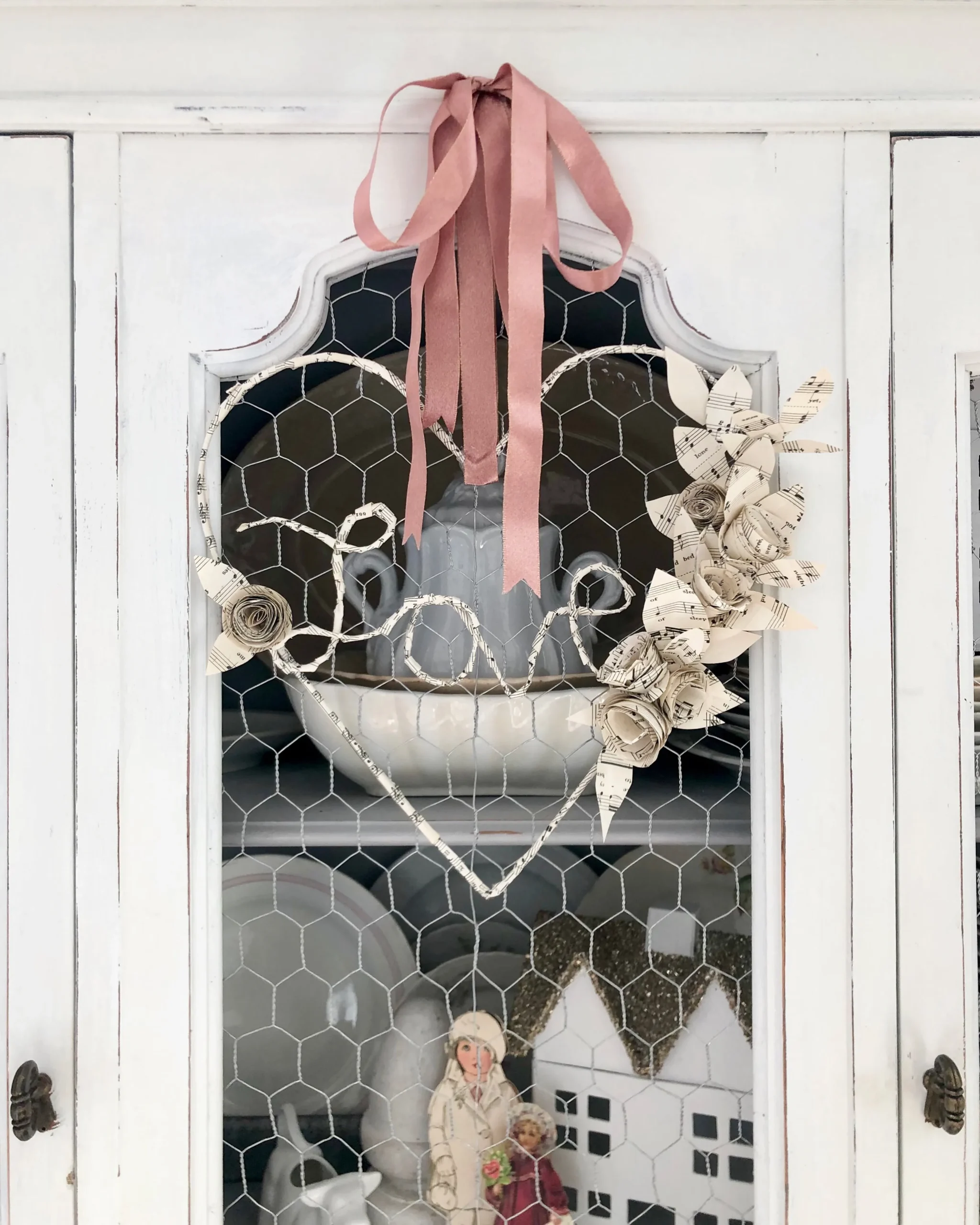 Vintage Valentine's Day decor idea featuring a romantic valentines wreath