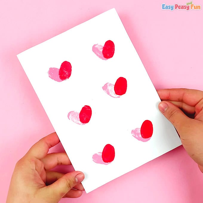 DIY Valentines kid-friendly craft idea featuring a card finger paint