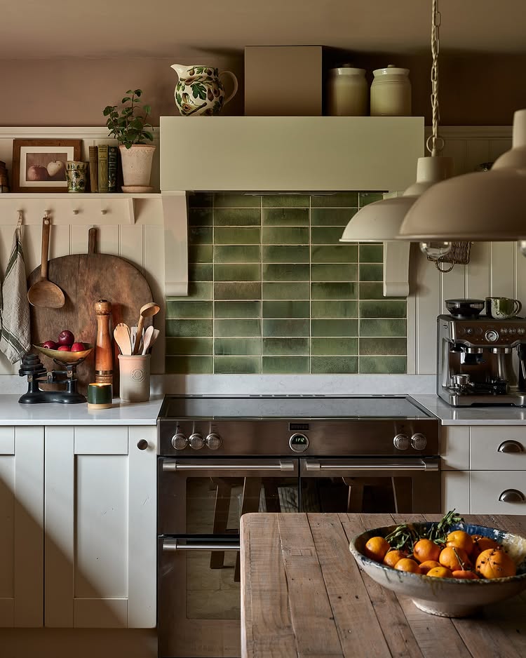 Real-life example of cottage style kitchen decor featuring green backsplash